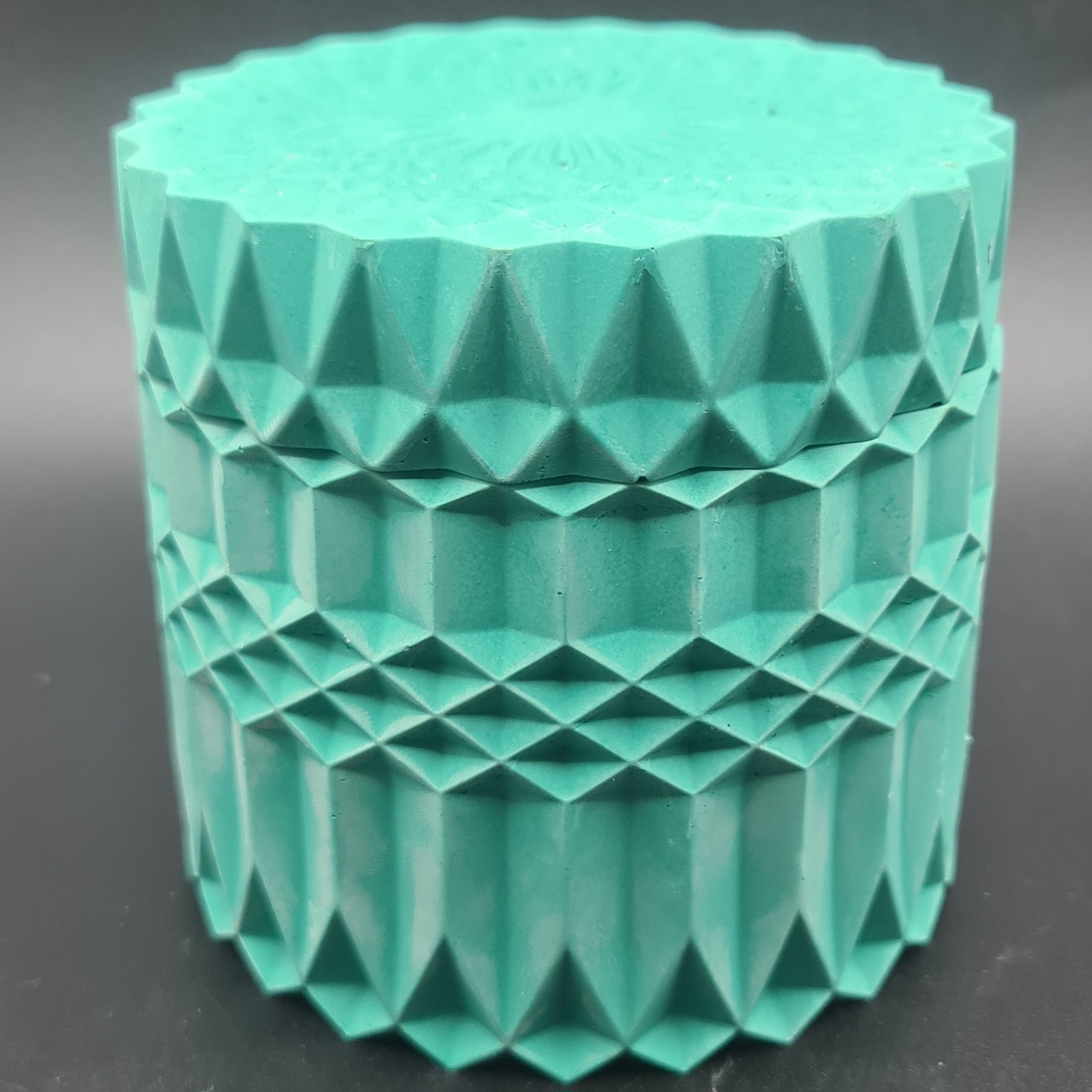 Handmade geometric candle pot, a statement piece for any room.